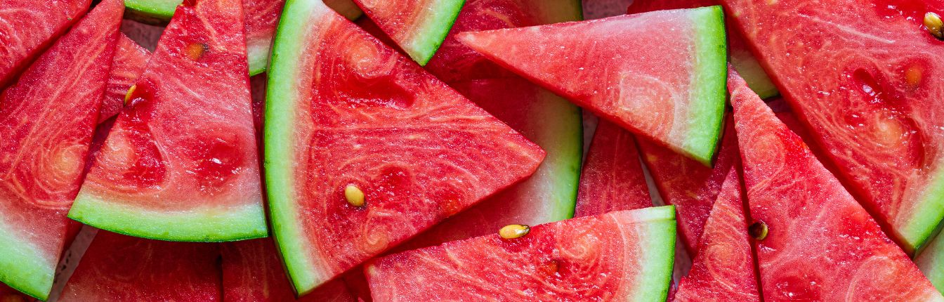 Slices of watermelon laid out together